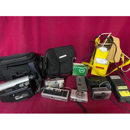 923 - Selection of assorted cameras and testing equipment.