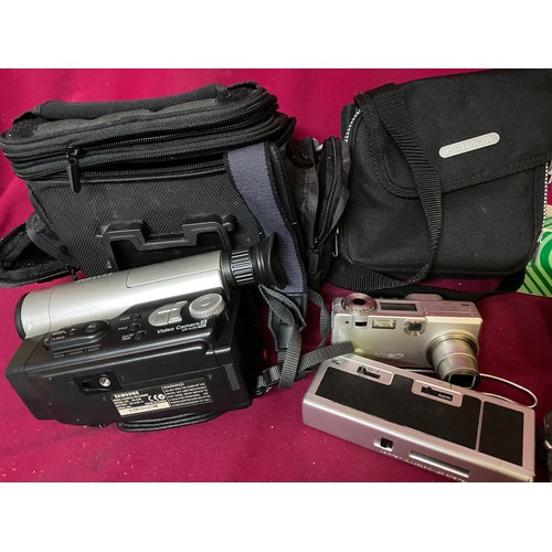 923 - Selection of assorted cameras and testing equipment.