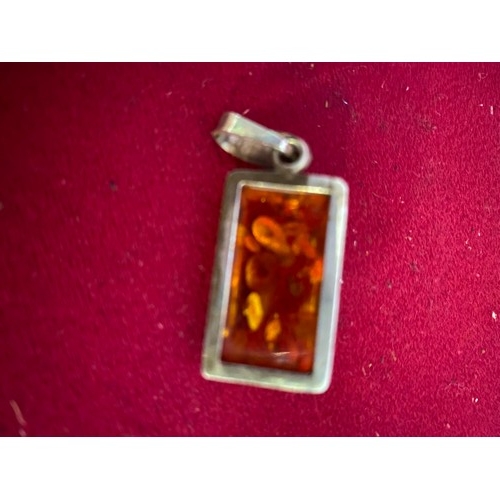 523 - Amber pendant with setting in sterling silver