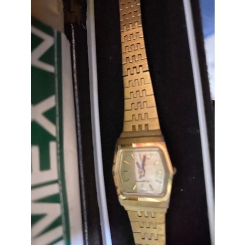 919 - Ladies gold tone timex watch with papers.