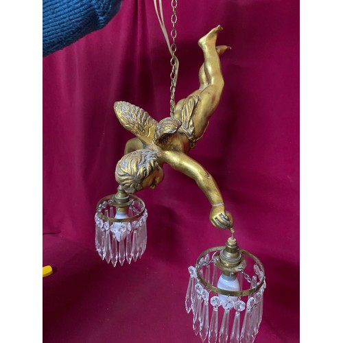 172 - Pair of Art Deco gold putti cherub hanging chandeliers with cherubs measuring 34 cms long