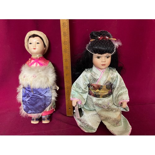 113 - Collection of 4 porcelain dolls with tallest measuring 46 cms tall