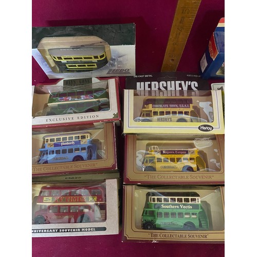 122 - Collection of 14 x Lledo boxed collectable buses and trams