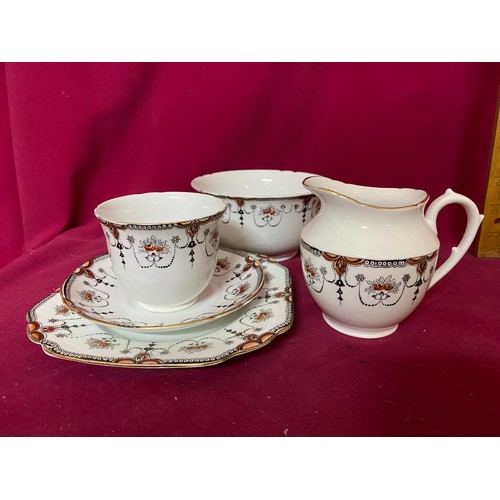 169 - A Melba Amari style teaset comprising 6 x side plates, 4 x cups and 6 saucers, milk and sugar bowl