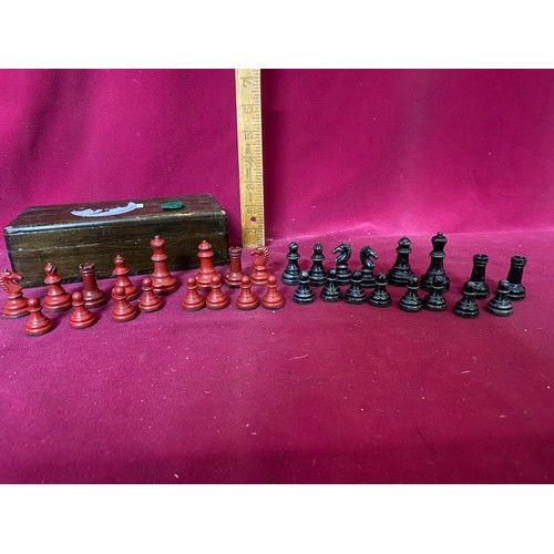 186 - 1950's die cast chess set and wooden board.