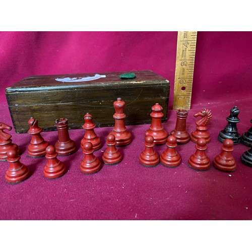 186 - 1950's die cast chess set and wooden board.