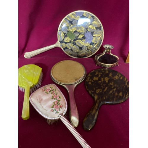 199 - Various Antique and vintage dressing table brushes, mirrors and trays.