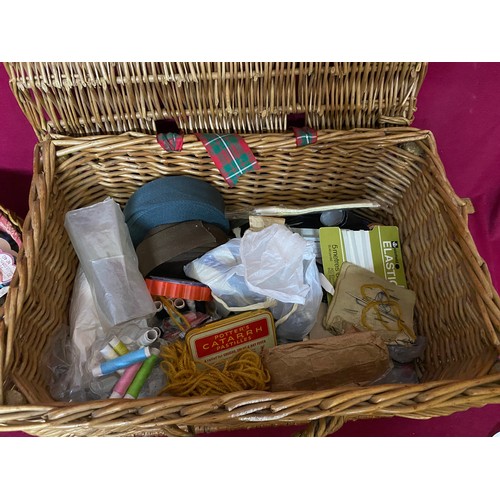 205 - 2 vintage sewing baskets filled with cottons, silks and needles.