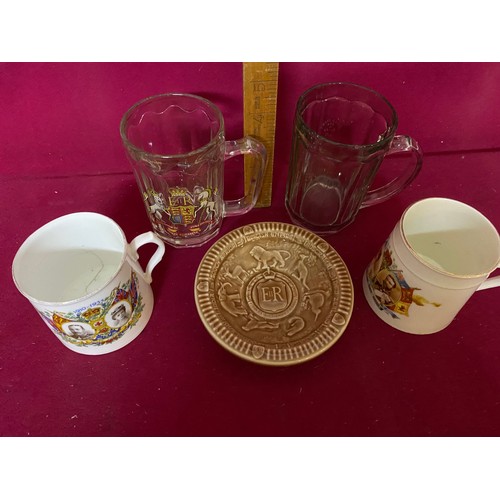 209 - Royal Memorabilia including Queen Elizabeth coronation book, George V and Queen Mary mugs.