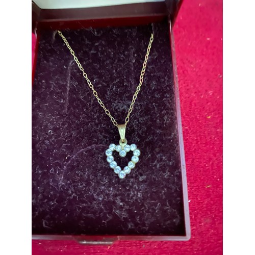 274 - Heart pendant on 9ct gold chain.