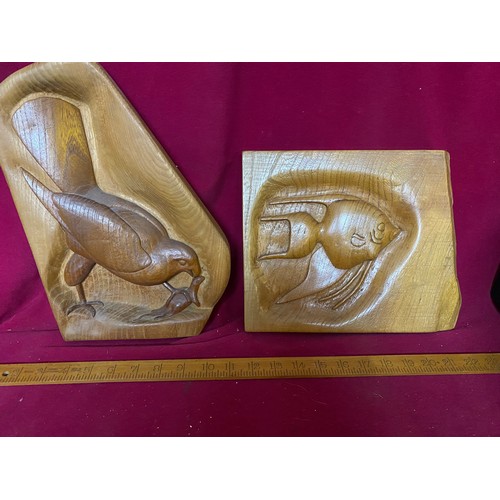 309 - Pair of mid century Carved Teak wall plaques.