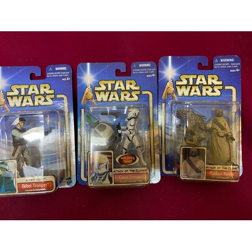 331 - 15 Star Wars Episode I Attack of the Clones figures, sealed on blue cards by Hasbro.