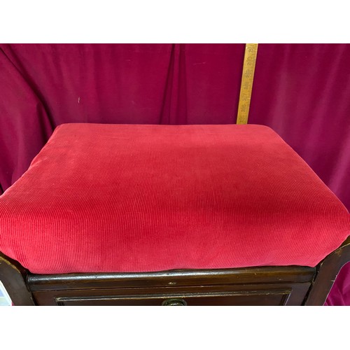 233 - Piano stool with red covered seat and 3 drawers to base with hinge fronts.