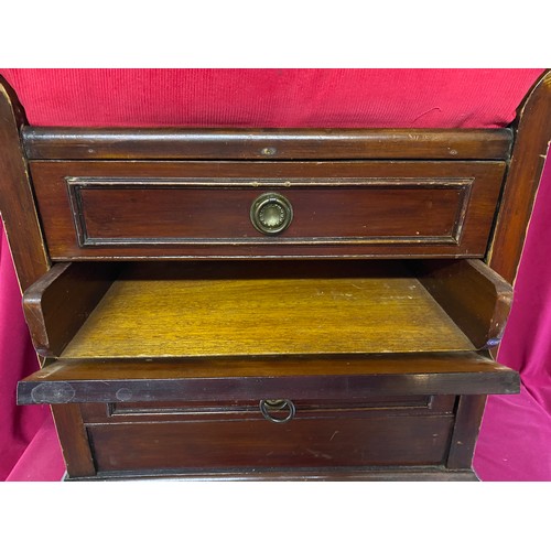 233 - Piano stool with red covered seat and 3 drawers to base with hinge fronts.