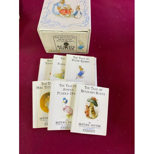 295 - 6 Beatrix Potter miniature books, Tailor of Gloucester Jemima Puddleduck moneybox and other Cown Sta... 