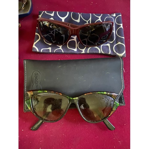 299 - 10 pairs of designer vintage men's and ladies sunglasses from Karen Millen and Katherine Hamnet.