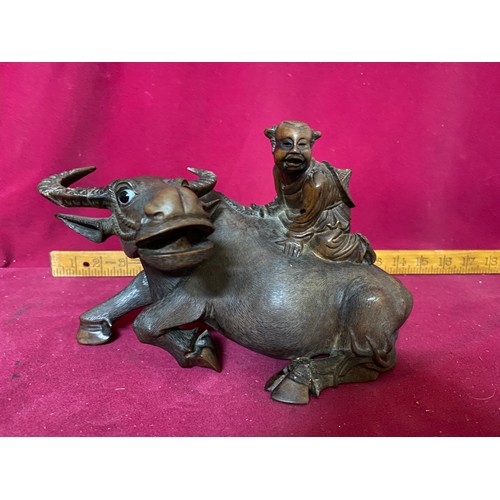 400 - Antique Chinese wood sculpture of a Water Buffalo. The horn and hoof have been restored but otherwis... 