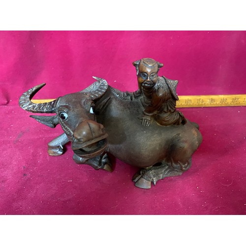 400 - Antique Chinese wood sculpture of a Water Buffalo. The horn and hoof have been restored but otherwis... 