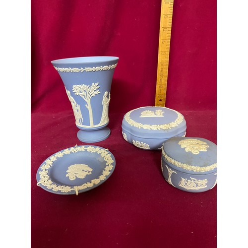 404 - Selection of Antique Blue Wedgwood Jasperware comprising of trinket pots and plates.