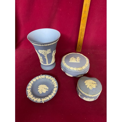 404 - Selection of Antique Blue Wedgwood Jasperware comprising of trinket pots and plates.