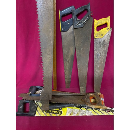 315 - Collection of saws including an antique two man saw