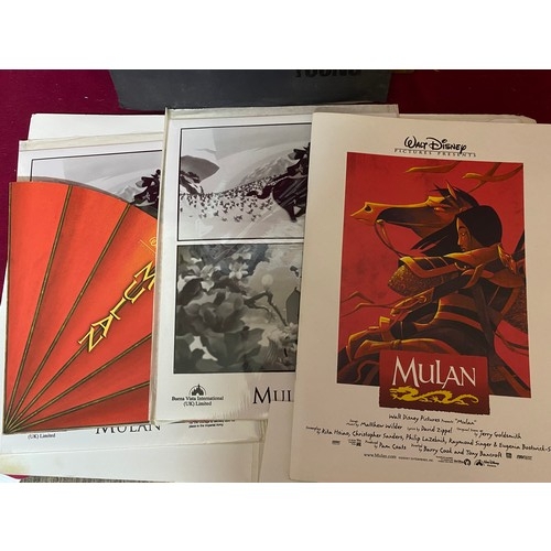 127 - 3 x press packs for 'mighty Joe young', 'mulan' and 'remember the titans'