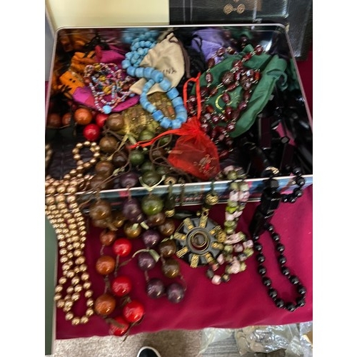 410 - Tin of assorted costume jewellery with Pewter Rococo style mirror and a selection of 5 jewellery cat... 