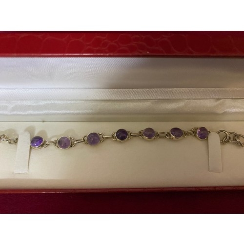 414 - Stone set bracelet marked 925 silver and in presentation box.