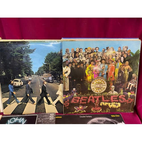 15 - Collection of Beatles LP records in record box.