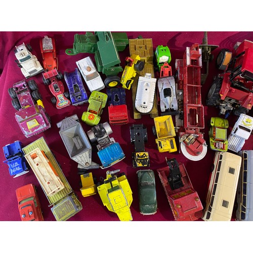 28 - Box of assorted vintage diecast cars.