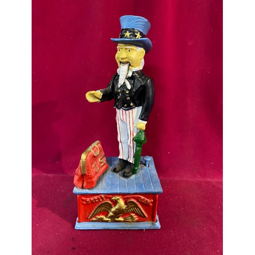 36 - Cast Iron Money Box depicting Uncle Sam.