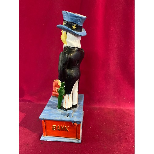 36 - Cast Iron Money Box depicting Uncle Sam.