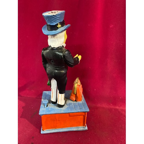 36 - Cast Iron Money Box depicting Uncle Sam.