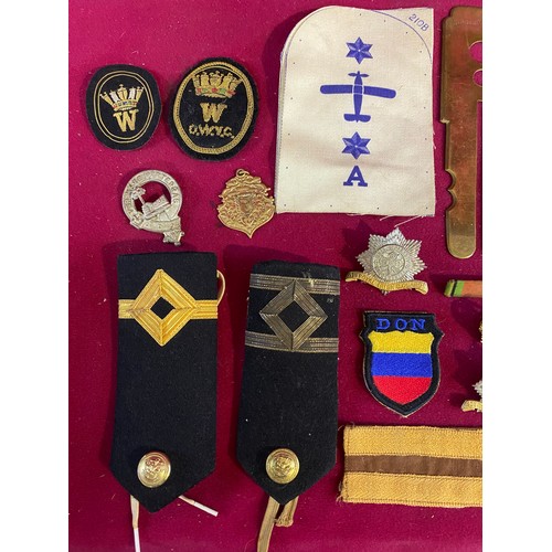 41 - Collection of Military Cap Badges and Patches.