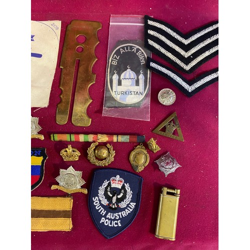 41 - Collection of Military Cap Badges and Patches.