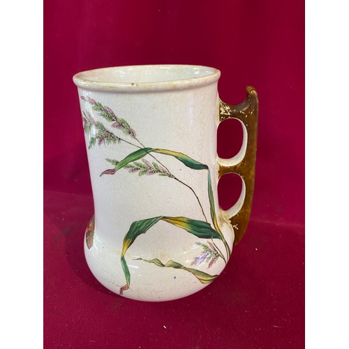 49 - Antique Minton jug decorated with Butterflies measuring 18cms tall