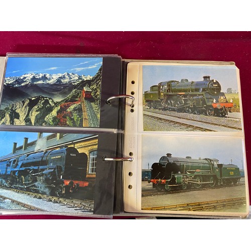 77 - 2 Albums of Rail, Train, Tram and Bus postcards and Photo's.