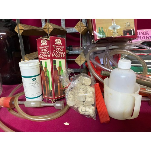 81 - Wine making kit with wine racks, demi johns and other equipment.