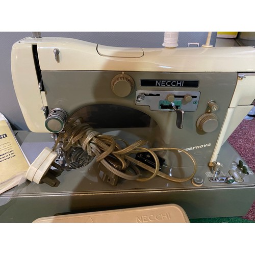 379 - Necchi Automatic Supernova sewing machine with accessories and manual