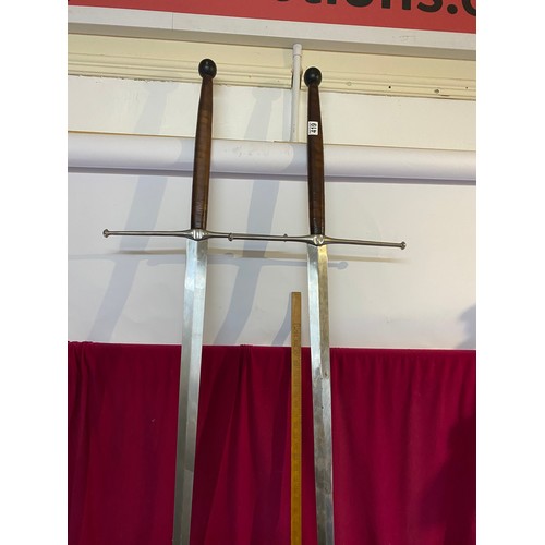 419 - Pair of large decorative display swords