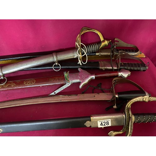 428 - Selection of 6 reproduction swords and 1 reproduction spear.