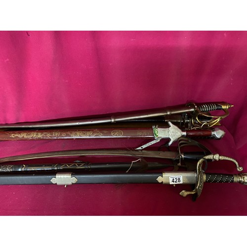 428 - Selection of 6 reproduction swords and 1 reproduction spear.