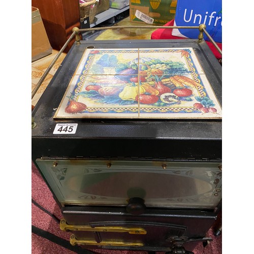 445 - Retro potato oven with tile top and brass fittings.