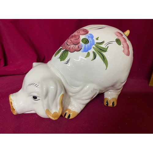 454 - 2 large pottery pig money boxes.