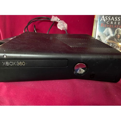 604 - Xbox 360 console, controller, power lead and 15 games. Fully tested and working