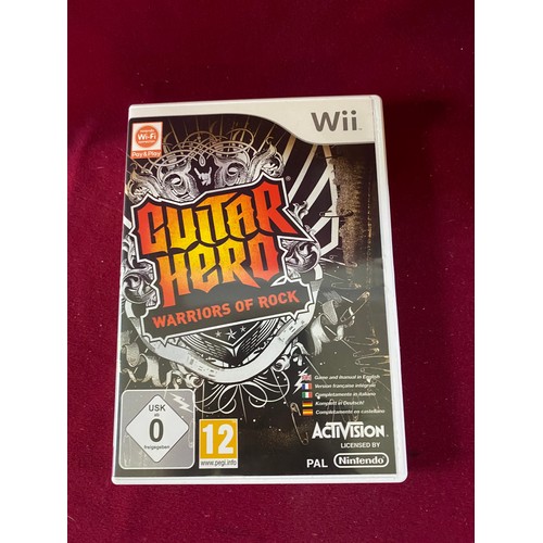 608 - Nintendo Wii 'warriors of rock' guitar hero game and guitar