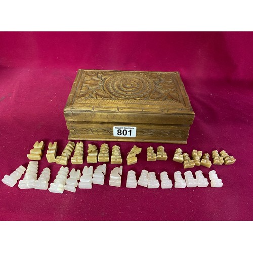 953 - Vintage hand carved wooden box measuring 20 x 13 x 7 cms tall containing set of chess pieces ( damag... 