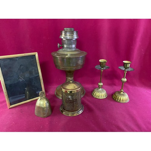 804 - Vintage brass including oil lamp, Schweppes bell, candlesticks etc