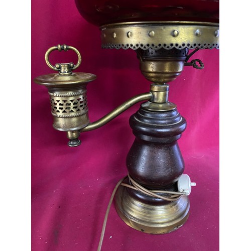 570 - Vintage oil lamp converted to electricity.