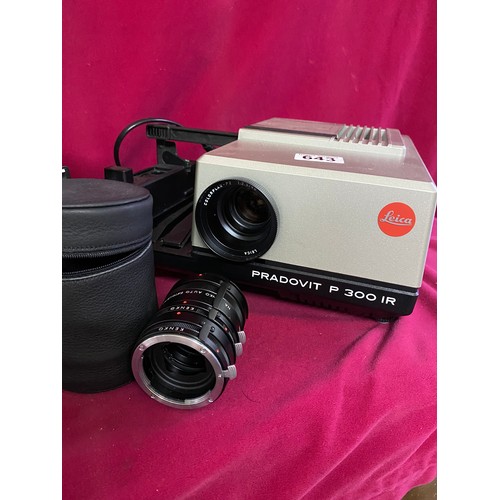 643 - A working Pradovit P 300 IR 35mm projector with selection of slides and Kenko auto extension tube